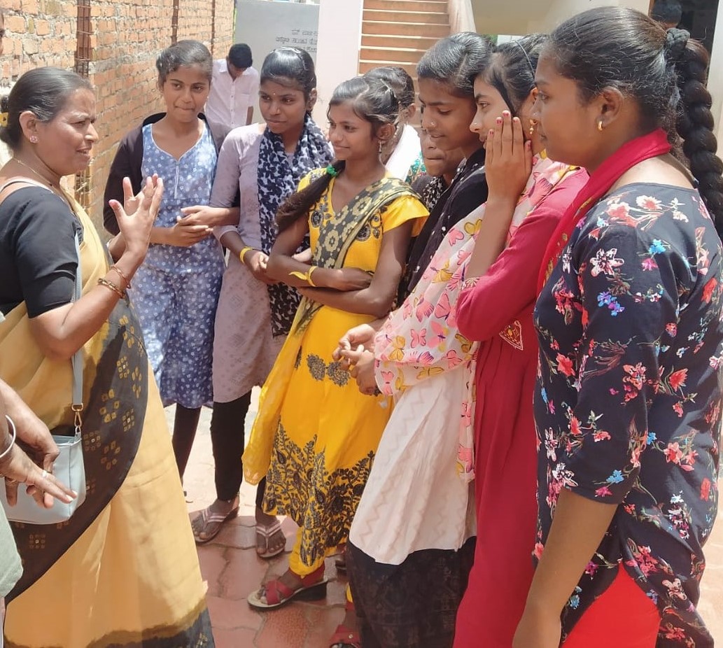 Adolescent girls in a village session with AMMA Foundation Raibag